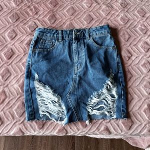 Pretty little thing distressed mini skirt